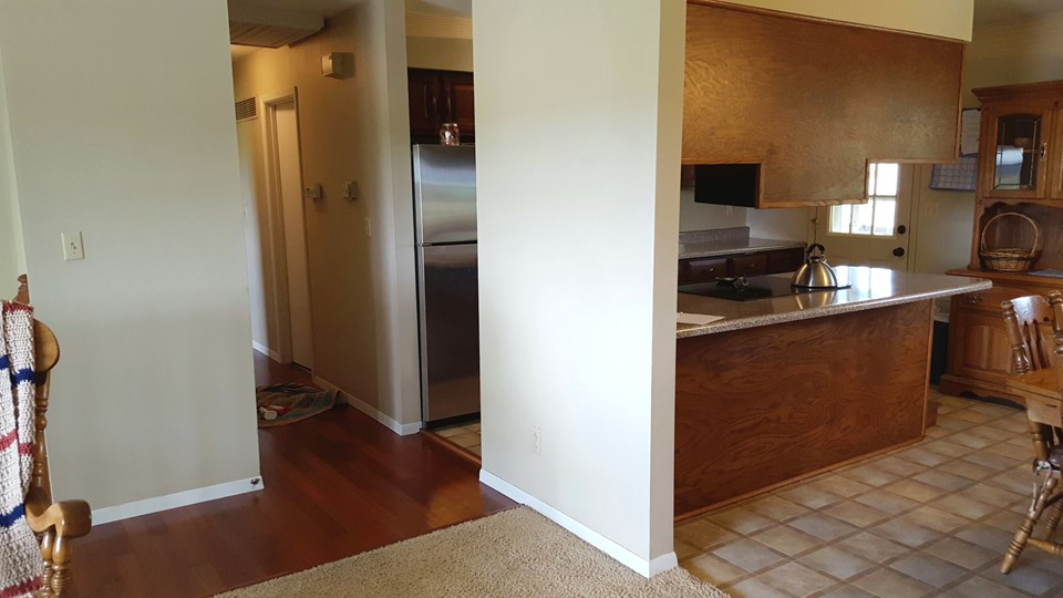 looking towards the kitchen.  note the hardwood in the hallway.