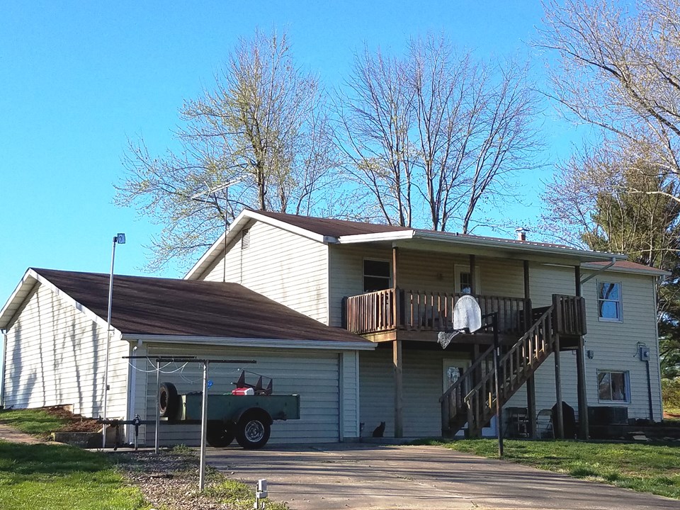 back of house has covered deck and patio for outside living!