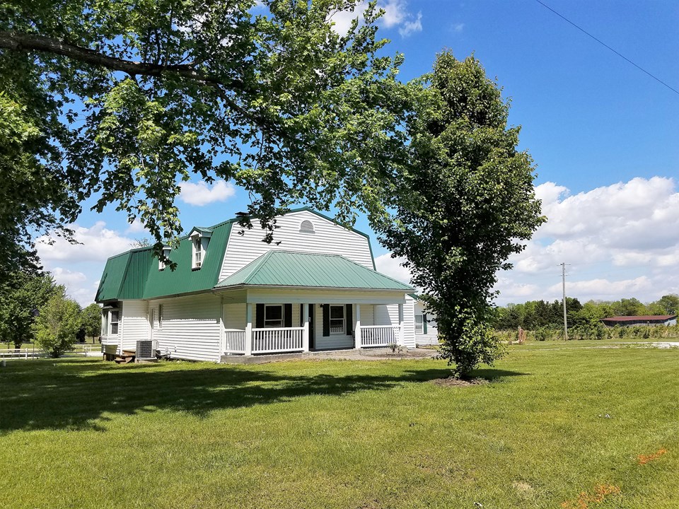 home with on a level 1-acre lot.